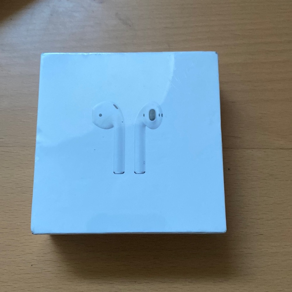 AirPods Second Generation (with platinum case)